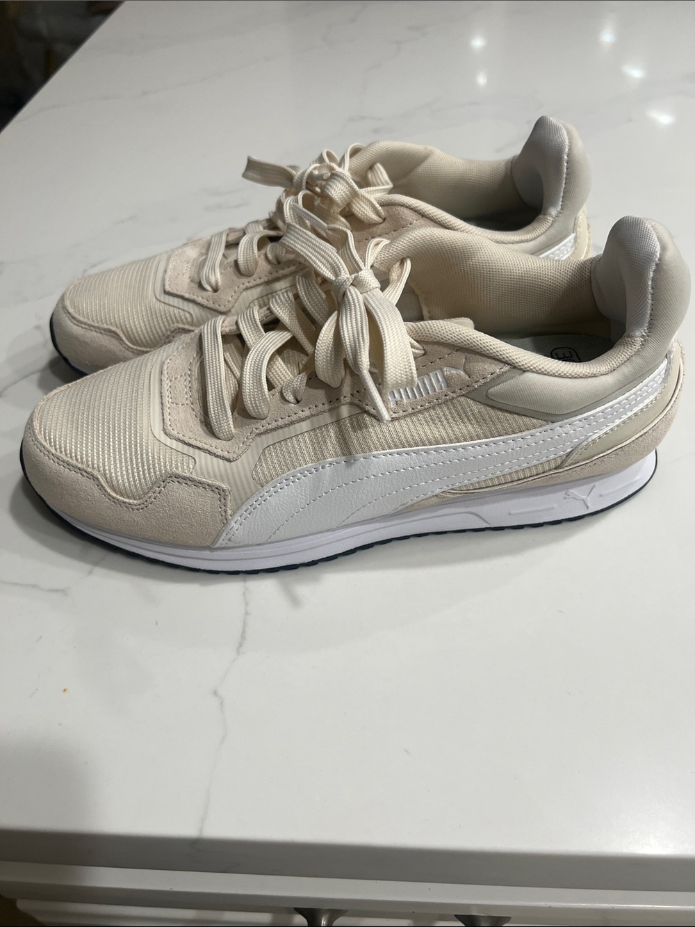 Puma Cream and White Low-Top Sneakers